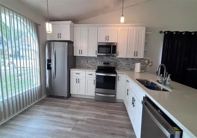 Photo 3 of Single family home for sale at 6518 Spring Land Ct, Orlando, FL 32818 | MLS# O6418060 | Listing updated on 2026-10-05