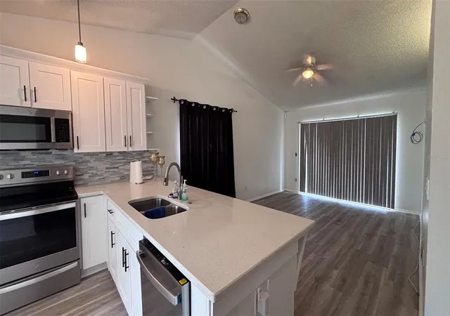 Photo 4 of Single family home for sale at 6518 Spring Land Ct, Orlando, FL 32818 | MLS# O6418060 | Listing updated on 2026-10-05