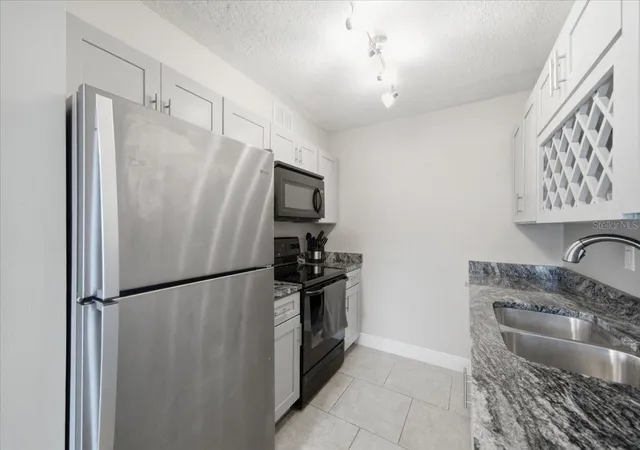 Photo 2 of Condo for sale at 4843 Coquina Key Dr Se #A, Saint Petersburg, FL 33705 | MLS# TB8520788 | Listing updated on 2026-09-05