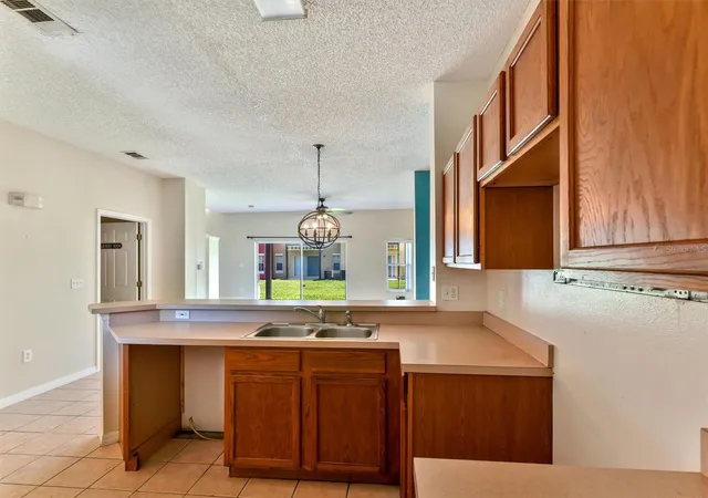 Photo 3 of Townhouse for sale at 8407 Blue Lagoon Dr, Kissimmee, FL 34747 | MLS# O6418125 | Listing updated on 2026-10-01