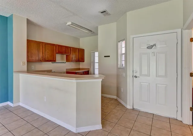 Photo 4 of Townhouse for sale at 8407 Blue Lagoon Dr, Kissimmee, FL 34747 | MLS# O6418125 | Listing updated on 2026-10-01