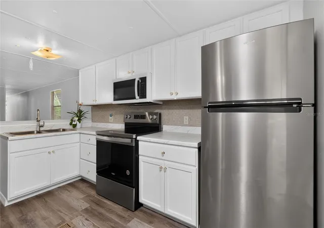 Photo 3 of Manufactured home for sale at 7526 Silage Cir, Port Charlotte, FL 33981 | MLS# C7527514 | Listing updated on 2026-09-06