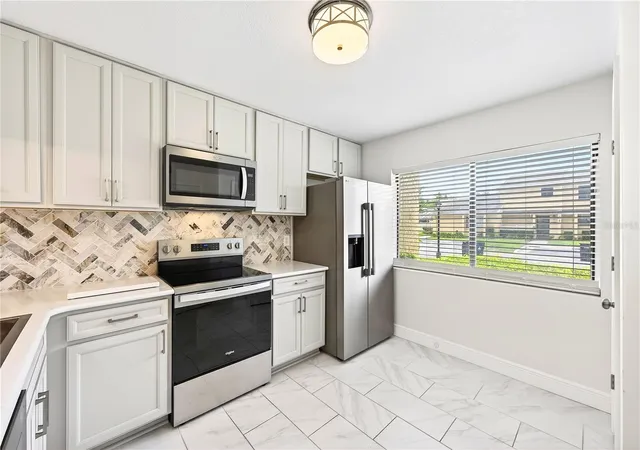 Listing Photo 4 - Condo for sale in building located at 2218 Mcmahon Ct, Orlando, FL 32812 - Unit #1038