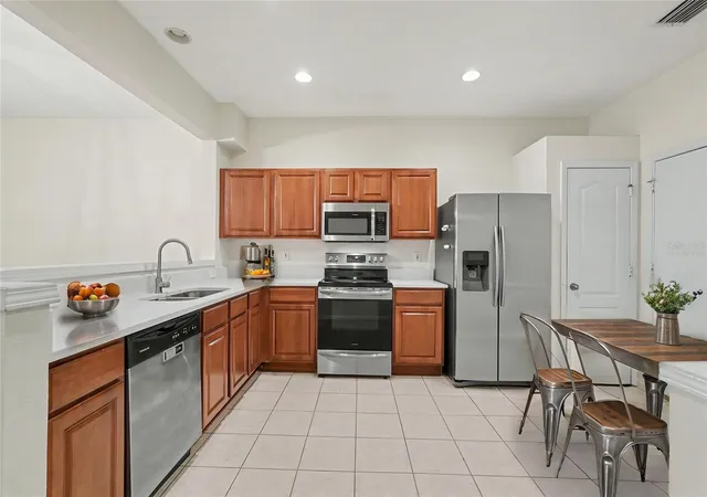Photo 3 of Townhouse for sale at 8471 Sandy Beach St, Tampa, FL 33634 | MLS# TB8520922 | Listing updated on 2026-10-01