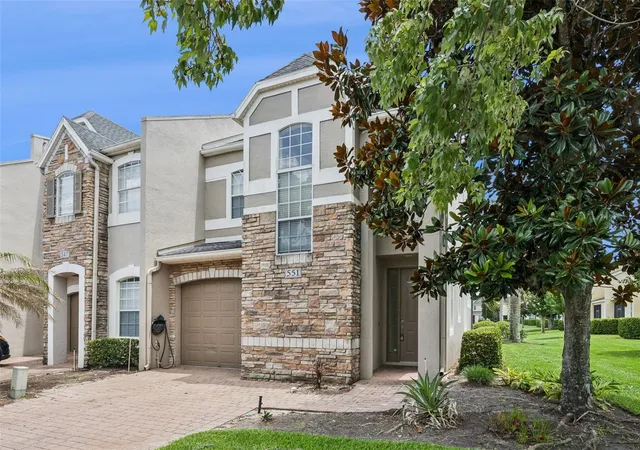 Photo 2 of Townhouse for sale at 551 Ter Spring Dr, Orlando, FL 32828 | MLS# O6418210 | Listing updated on 2026-09-06