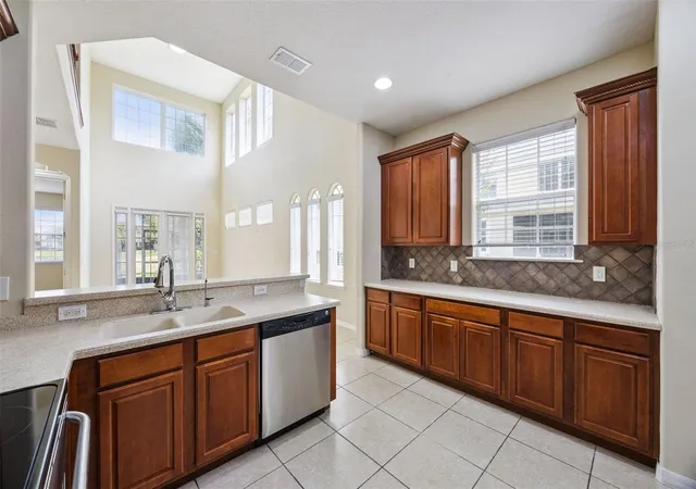 Photo 3 of Townhouse for sale at 551 Ter Spring Dr, Orlando, FL 32828 | MLS# O6418210 | Listing updated on 2026-09-06