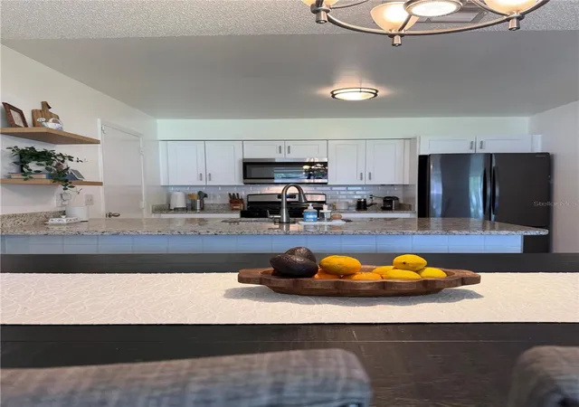 Photo 3 of Single family home for sale at 4808 Ganimede Ln, Orlando, FL 32821 | MLS# O6418220 | Listing updated on 2026-09-04