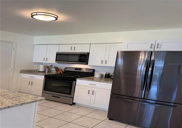Photo 4 of Single family home for sale at 4808 Ganimede Ln, Orlando, FL 32821 | MLS# O6418220 | Listing updated on 2026-09-04