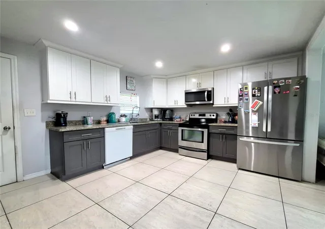 Photo 3 of Single family home for sale at 709 E 119th Avenue, Tampa, FL 33612 | MLS# TB8520949 | Listing updated on 2026-08-16