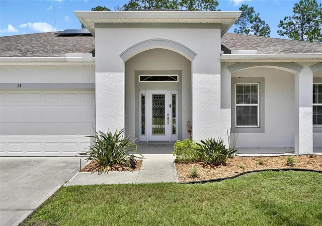 Photo 4 of Single family home for sale at 34 Bunker Hl Dr, Palm Coast, FL 32137 | MLS# FC319385 | Listing updated on 2026-10-02