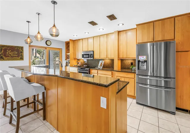 Photo 3 of Townhouse for sale at 990 San Carlos Ct NE, Saint Petersburg, FL 33702 | MLS# TB8521003 | Listing updated on 2026-09-12