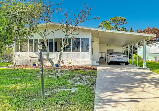 Photo 1 of Manufactured home for sale at 8227 Cinnamon Ln, Port Saint Lucie, FL 34952 | MLS# N6144773 | Listing updated on 2026-09-04