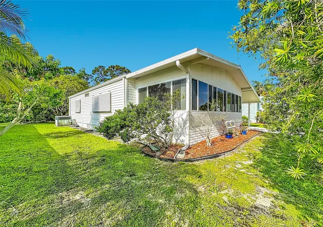 Photo 3 of Manufactured home for sale at 8227 Cinnamon Ln, Port Saint Lucie, FL 34952 | MLS# N6144773 | Listing updated on 2026-09-04
