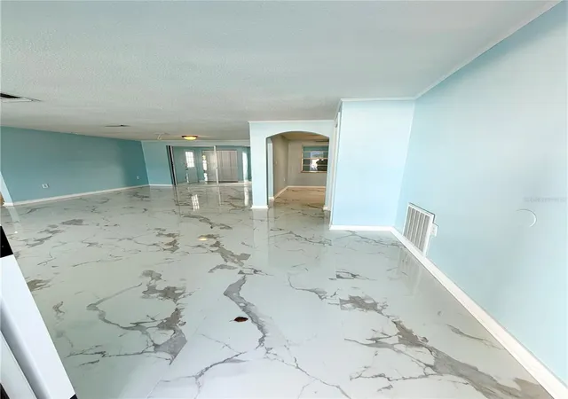 Photo 3 of Single family home for sale at 7040 Fox Holw Dr, Port Richey, FL 34668 | MLS# W7886876 | Listing updated on 2026-07-10
