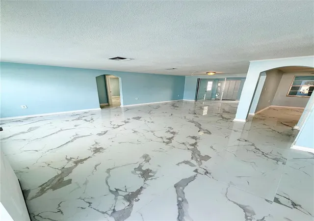 Photo 4 of Single family home for sale at 7040 Fox Holw Dr, Port Richey, FL 34668 | MLS# W7886876 | Listing updated on 2026-07-10