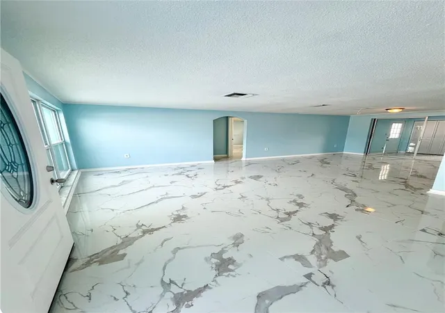 Photo 5 of Single family home for sale at 7040 Fox Holw Dr, Port Richey, FL 34668 | MLS# W7886876 | Listing updated on 2026-07-10