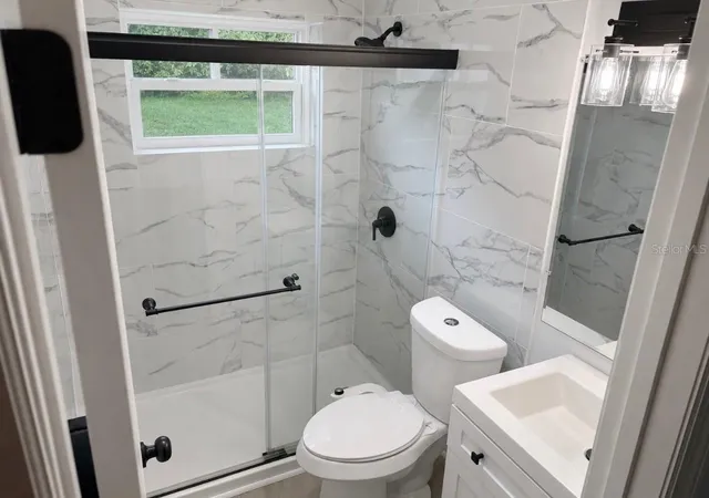 Photo 3 of Single family home for sale at 300 S Buena Vista Ave, Orlando, FL 32835 | MLS# TB8521063 | Listing updated on 2026-09-03