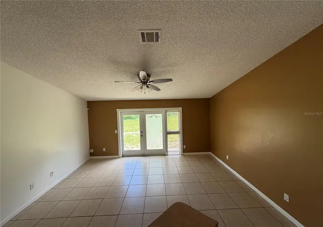Photo 2 of Single family home for sale at 8061 Windy Hl Way, Orlando, FL 32818 | MLS# O6418300 | Listing updated on 2026-08-21