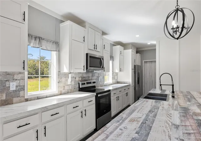 3rd image of 2362 Ne County Road 1469, Hawthorne, FL 32640 | MLS# GC541340