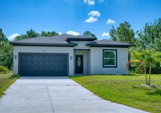 Photo 1 of Single family home for sale at 158 Chickering St, Port Charlotte, FL 33954 | MLS# A4697565 | Listing updated on 2026-09-11