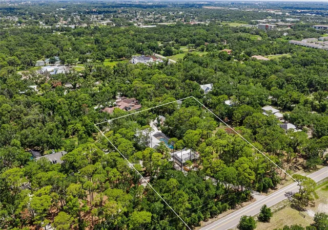 Photo 3 of Single family home for sale at 2810 Sarasota Golf Clb Blvd, Sarasota, FL 34240 | MLS# A4697611 | Listing updated on 2026-08-08