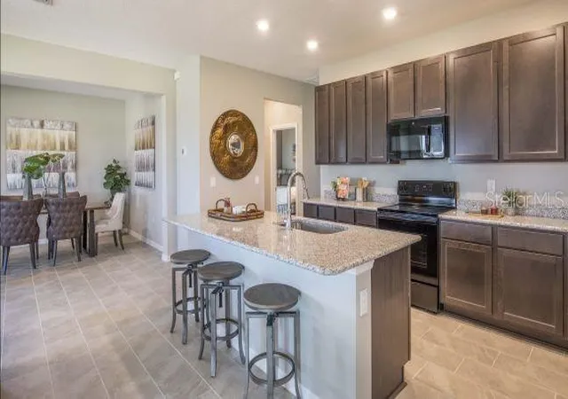 Photo 2 of Single family home for sale at 1927 Travelers Palm Dr, Edgewater, FL 32141 | MLS# O6418494 | Listing updated on 2026-06-20