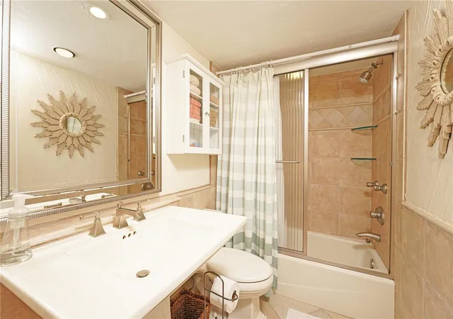 Listing Photo 2 - Condo for sale in building located at 5600 Bch Wy Dr, Sarasota, FL 34242 - Unit #213