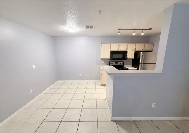 Photo 3 of Condo for sale at 4328 S Kirkman Rd #1303, Orlando, FL 32811 | MLS# R4911493 | Listing updated on 2026-07-24
