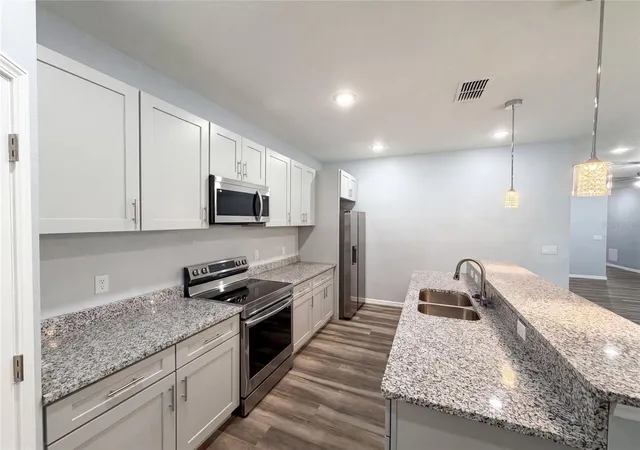 Photo 3 of Single family home for sale at 1013 W 11th Street, Sanford, FL 32771 | MLS# O6418639 | Listing updated on 2026-10-09