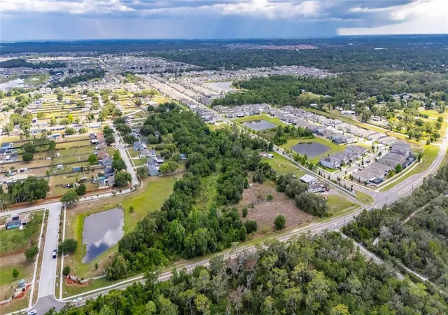 Photo 1 of Land for sale at 13311 Rhodine Rd, Riverview, FL 33579 | MLS# TB8521492 | Listing updated on 2026-07-29