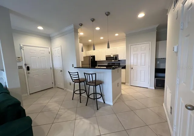 Photo 3 of Condo for sale at 4307 Bayside Village Dr #201, Tampa, FL 33615 | MLS# A4697671 | Listing updated on 2026-06-21