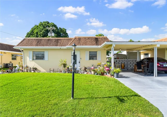 Photo 1 of Single family home for sale at 2208 Gardenia Way, Lehigh Acres, FL 33936 | MLS# TB8521583 | Listing updated on 2026-09-23