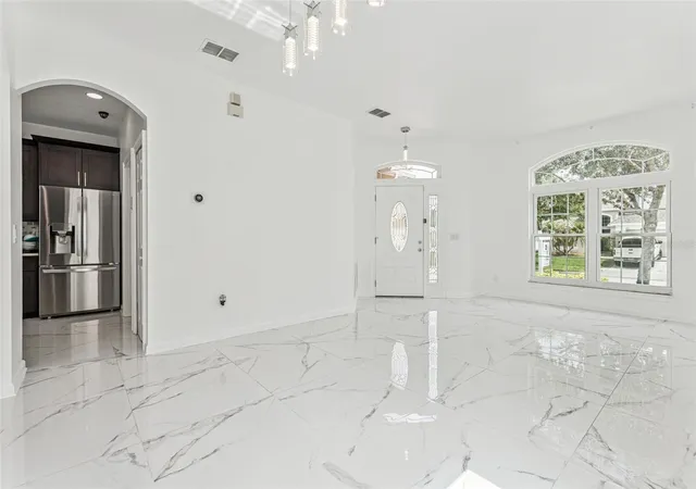 Photo 3 of Sale Pending at 8915 Victoria Isle Pl, Orlando, FL 32829 | MLS# O6418732 | Listing updated on 2026-09-22