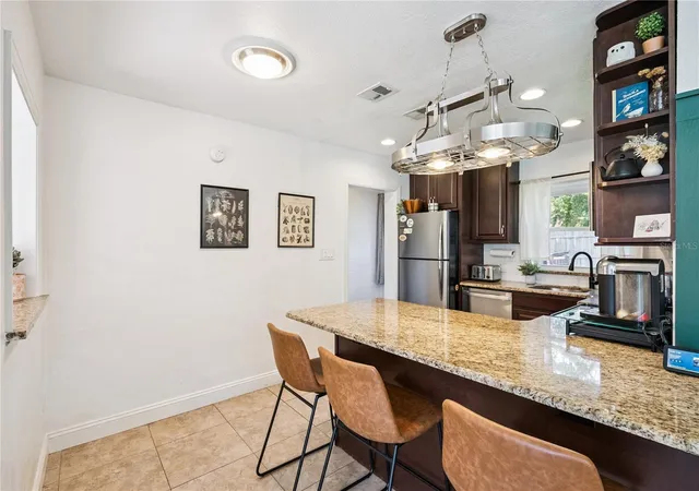 Photo 4 of Single family home for sale at 1909 Fern Cir, Orlando, FL 32803 | MLS# O6418747 | Listing updated on 2026-09-02
