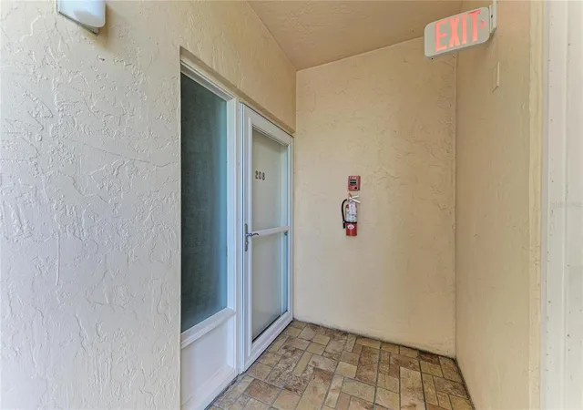 Listing Photo 4 - Condo for sale in building located at 8625 Midnight Pass Rd, Siesta Key, FL 34242 - Unit #208B