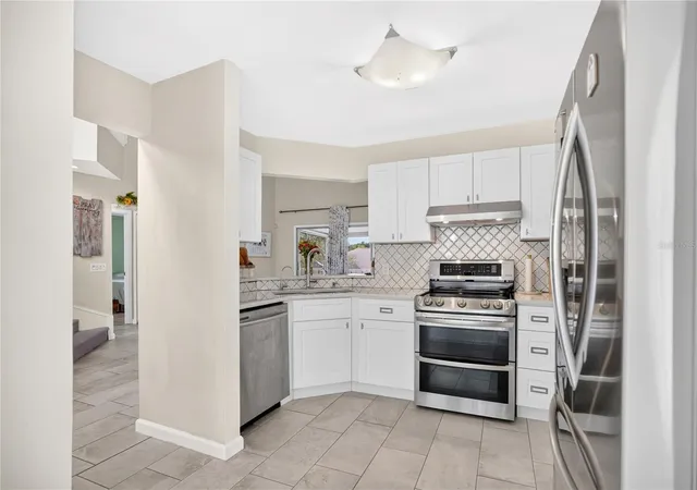 Photo 3 of Townhouse for sale at 7408 Little Pond Ct, Orlando, FL 32810 | MLS# S5152285 | Listing updated on 2026-09-09