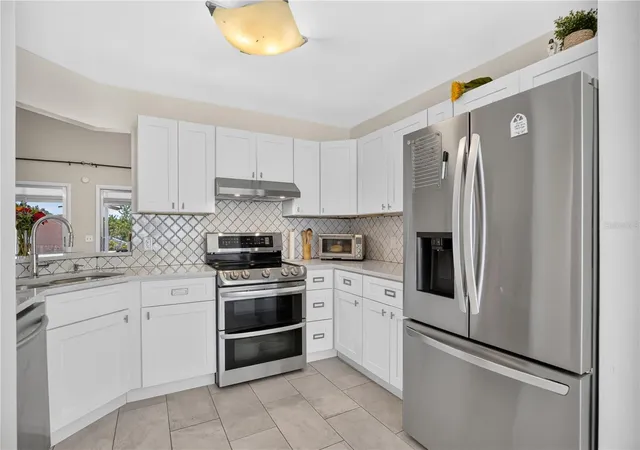 Photo 4 of Townhouse for sale at 7408 Little Pond Ct, Orlando, FL 32810 | MLS# S5152285 | Listing updated on 2026-09-09