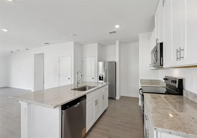 Photo 4 of Single family home for sale at 106 Wandering Crk Way, Palm Coast, FL 32164 | MLS# TB8521760 | Listing updated on 2026-07-20