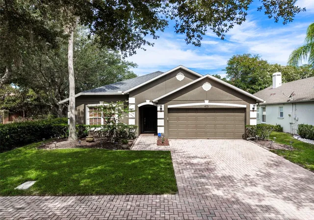 Photo 1 of Single family home for sale at 4618 Conroy Clb Dr, Orlando, FL 32835 | MLS# O6418899 | Listing updated on 2026-09-04
