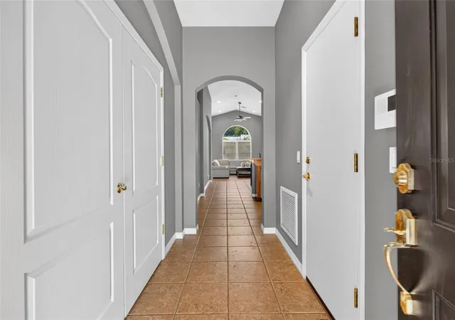 Photo 3 of Single family home for sale at 4618 Conroy Clb Dr, Orlando, FL 32835 | MLS# O6418899 | Listing updated on 2026-09-04