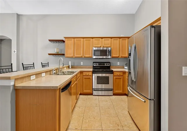 Photo 3 of Single family home for sale at 4618 Conroy Clb Dr, Orlando, FL 32835 | MLS# O6418899 | Listing updated on 2026-09-04