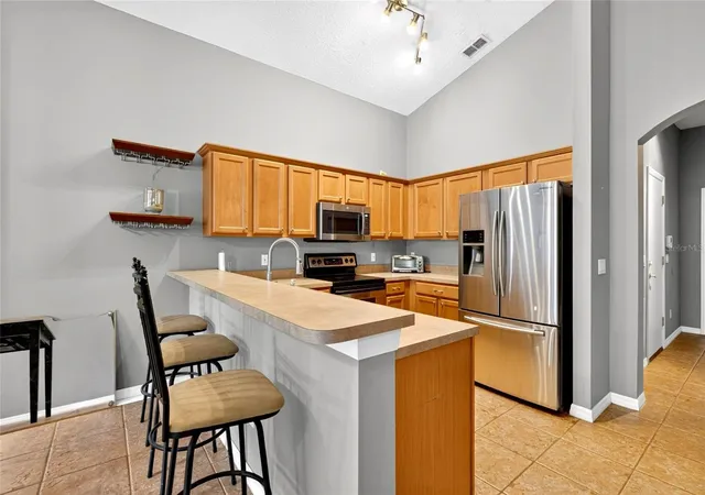 Photo 4 of Single family home for sale at 4618 Conroy Clb Dr, Orlando, FL 32835 | MLS# O6418899 | Listing updated on 2026-09-04