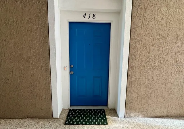 Listing Photo 4 - Condo for sale in building located at 7109 Yacht Basin Ave, Orlando, FL 32835 - Unit #418