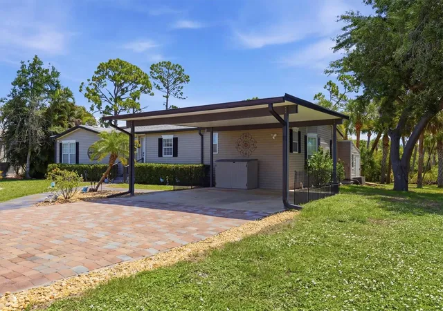 Photo 3 of Manufactured home for sale at 9158 Pinehaven Way, Englewood, FL 34224 | MLS# D6147870 | Listing updated on 2026-08-13
