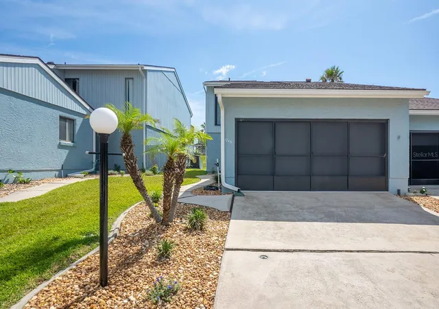 3rd image of 1746 Windsong Cir, Flagler Beach, FL 32136 | MLS# FC319444