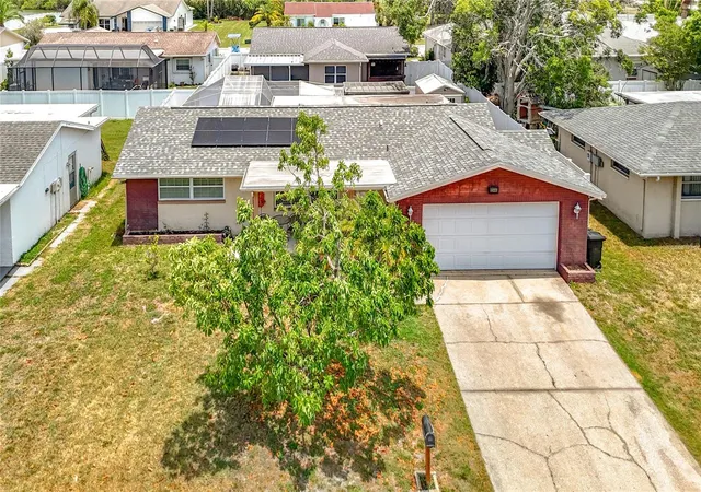 Photo 1 of Single family home for sale at 8944 Ledgestone Ln, Port Richey, FL 34668 | MLS# TB8521915 | Listing updated on 2026-08-04