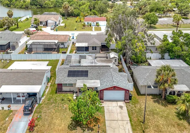 Photo 2 of Single family home for sale at 8944 Ledgestone Ln, Port Richey, FL 34668 | MLS# TB8521915 | Listing updated on 2026-08-04
