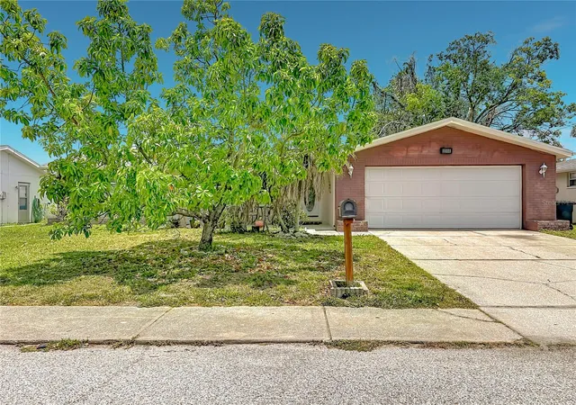 Photo 3 of Single family home for sale at 8944 Ledgestone Ln, Port Richey, FL 34668 | MLS# TB8521915 | Listing updated on 2026-08-04
