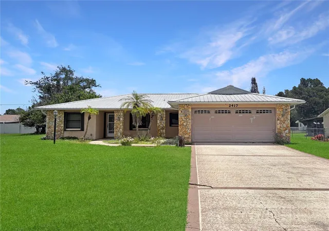 Photo 1 of Single family home for sale at 2417 Travelers Palm Dr, Edgewater, FL 32141 | MLS# O6418971 | Listing updated on 2026-07-30