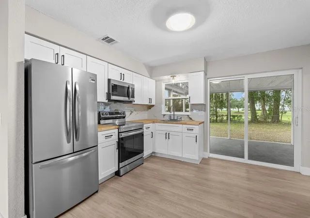 Photo 4 of Single family home for sale at 5399 Mustang Way, Orlando, FL 32810 | MLS# S5152321 | Listing updated on 2026-08-06